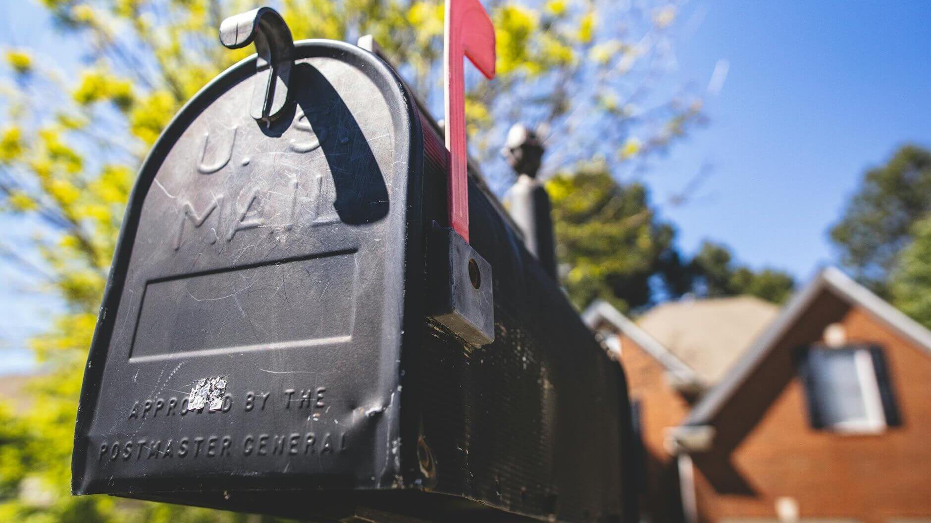 selective focus photography of a mailbox